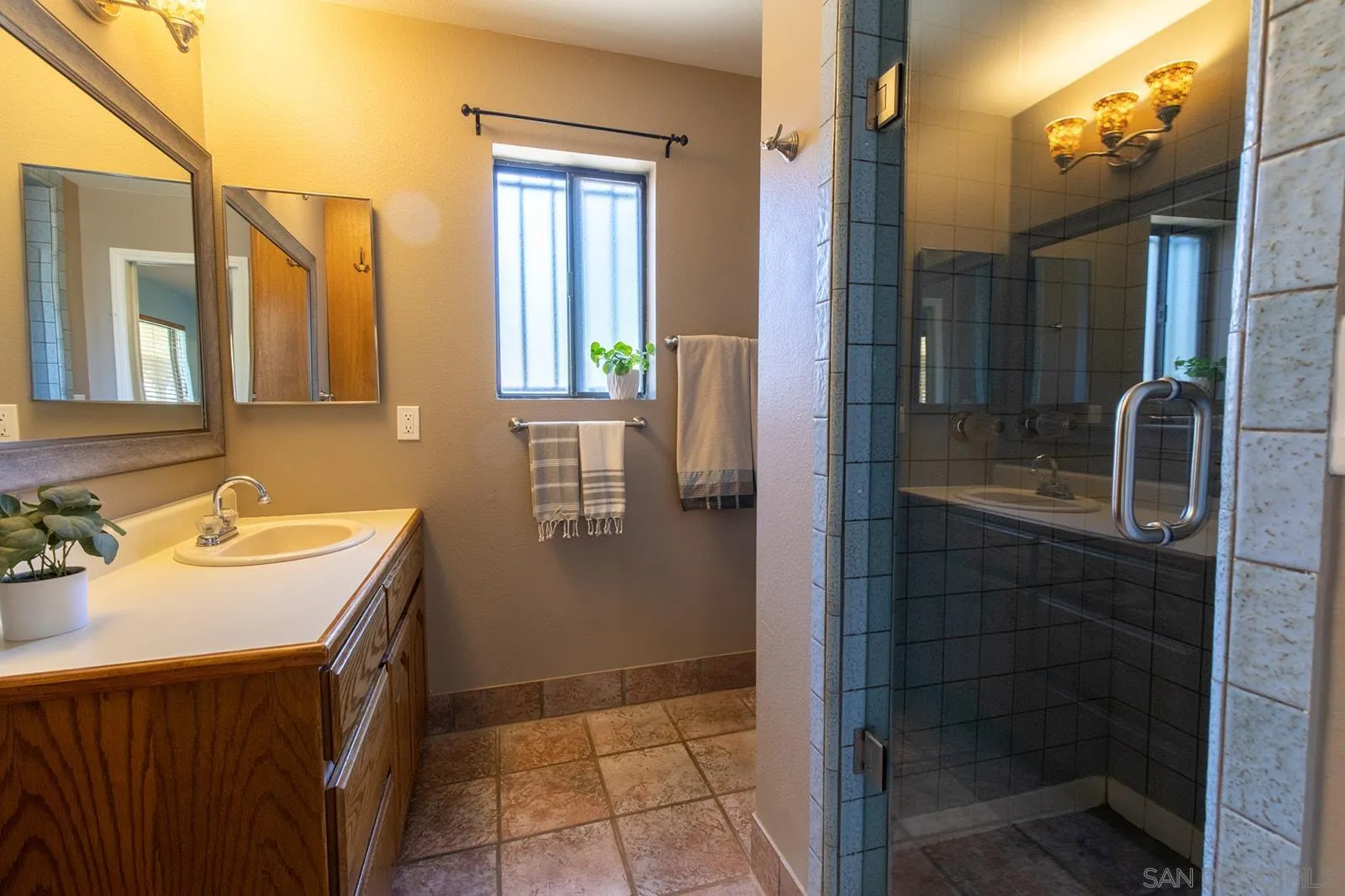 5754 Brandt Road Brawley, CA 92227 - Photo 34 of 48 a bathroom with a sink a toilet and shower