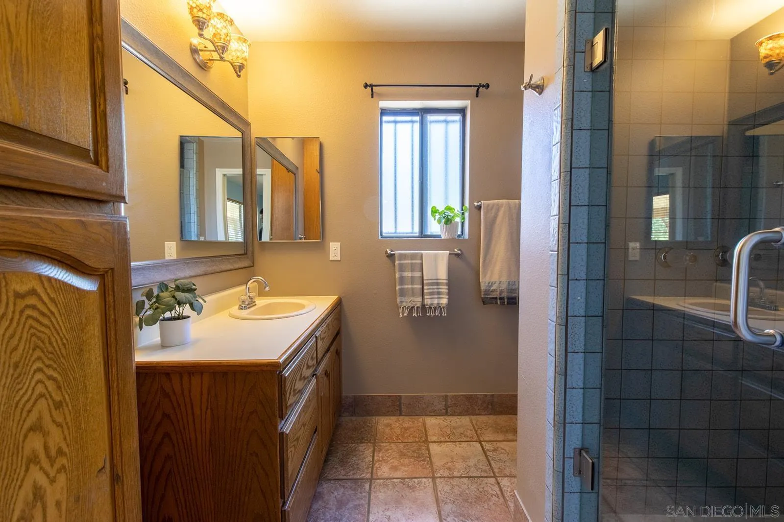 5754 Brandt Road Brawley, CA 92227 - Photo 35 of 48 a bathroom with a sink a toilet and shower