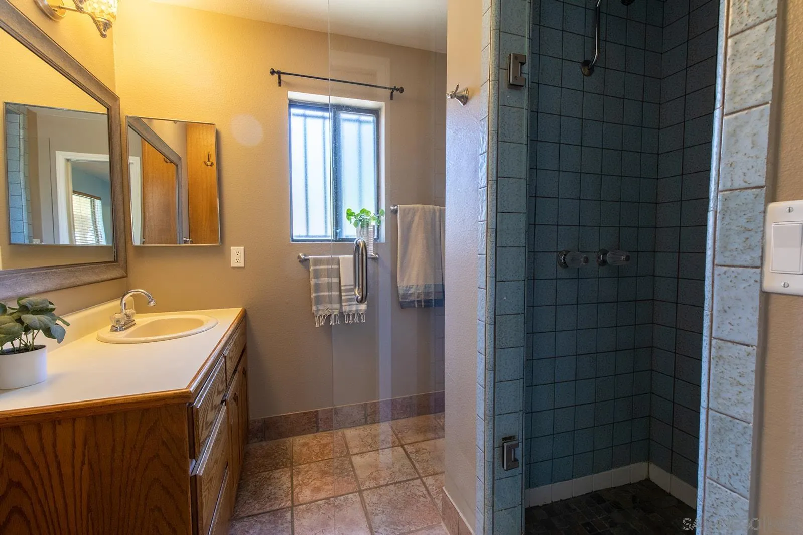 5754 Brandt Road Brawley, CA 92227 - Photo 36 of 48 a bathroom with a sink a toilet and shower