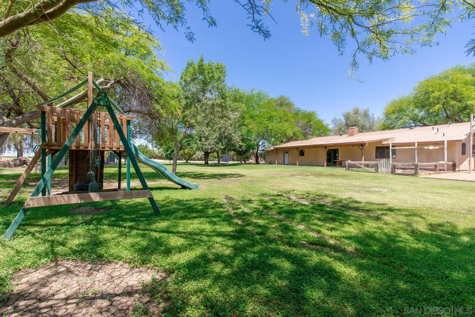 5754 Brandt Road Brawley, CA 92227 - Photo 38 of 48 a house that has sitting area in backyard