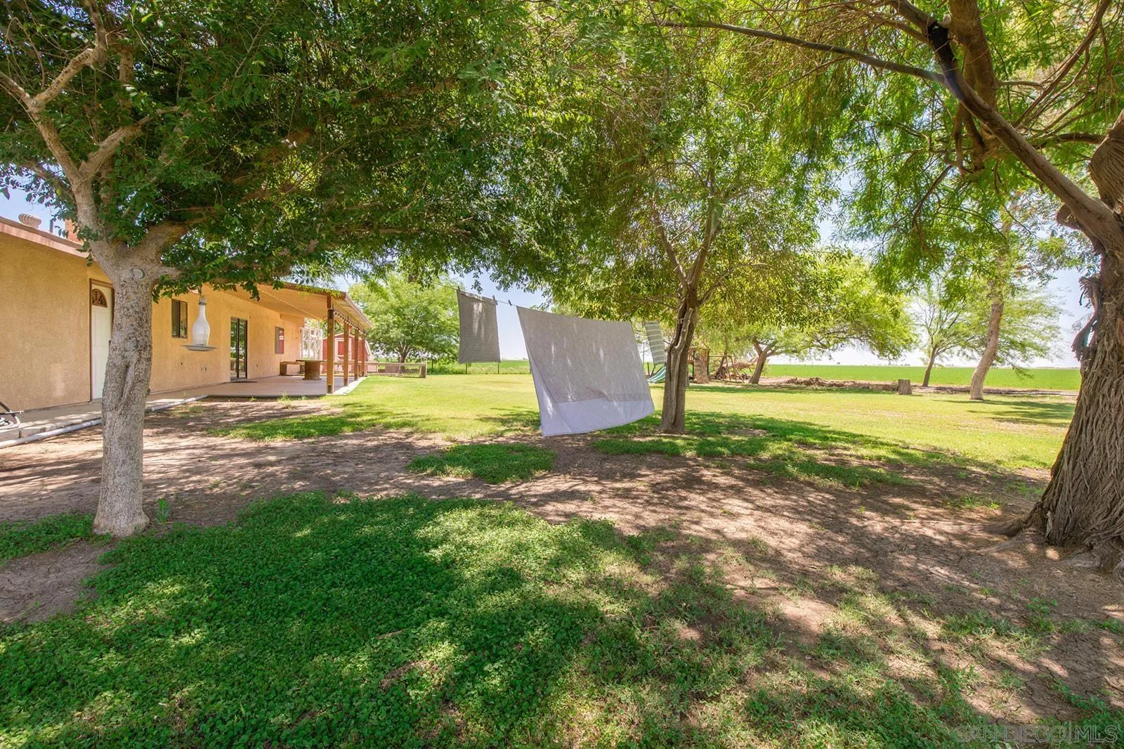 5754 Brandt Road Brawley, CA 92227 - Photo 41 of 48 a backyard of a house with a yard and outdoor seating