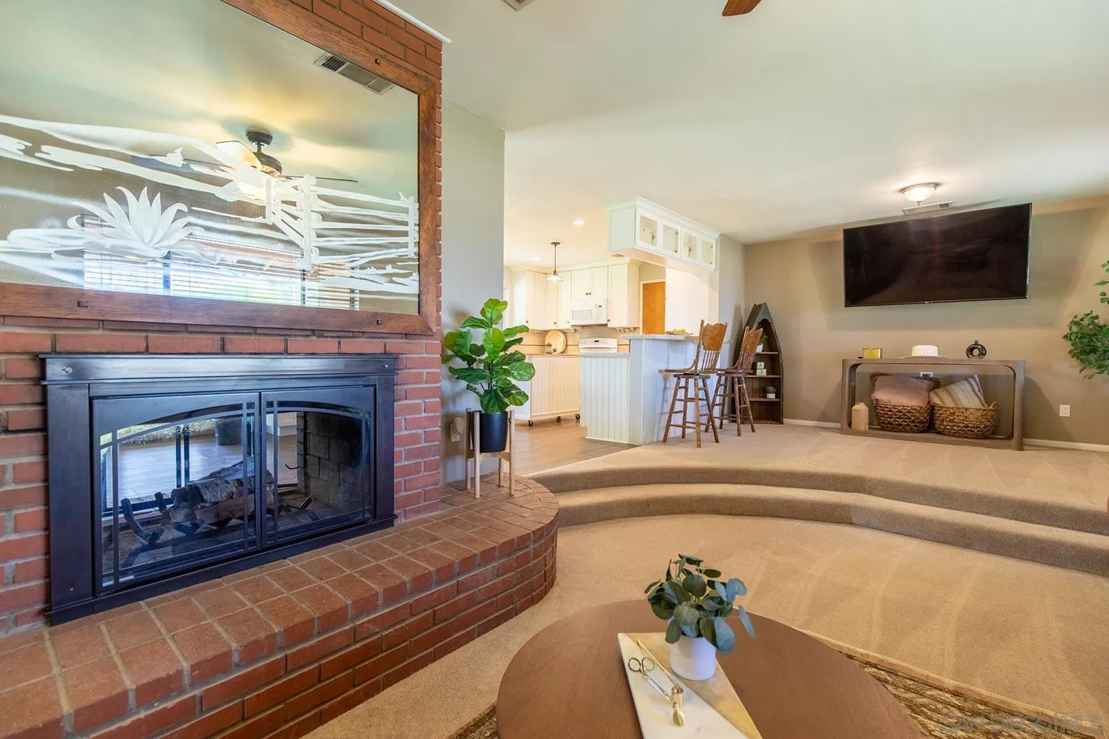 5754 Brandt Road Brawley, CA 92227 - Photo 5 of 48 a living room with furniture and a fireplace