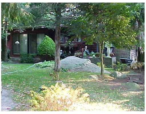 Land. Nicely treed lot - 5BR ISDS - existing dwelling must be razed...