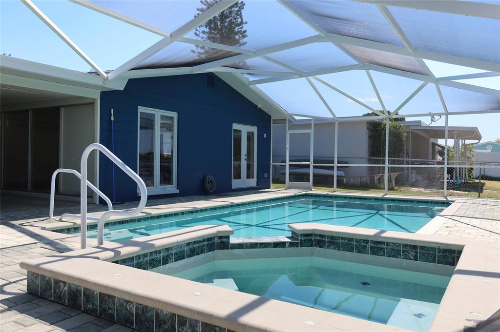 4240 Floramar Terrace New Port Richey, FL 34652 - Photo 28 of 51 a view of a house with backyard