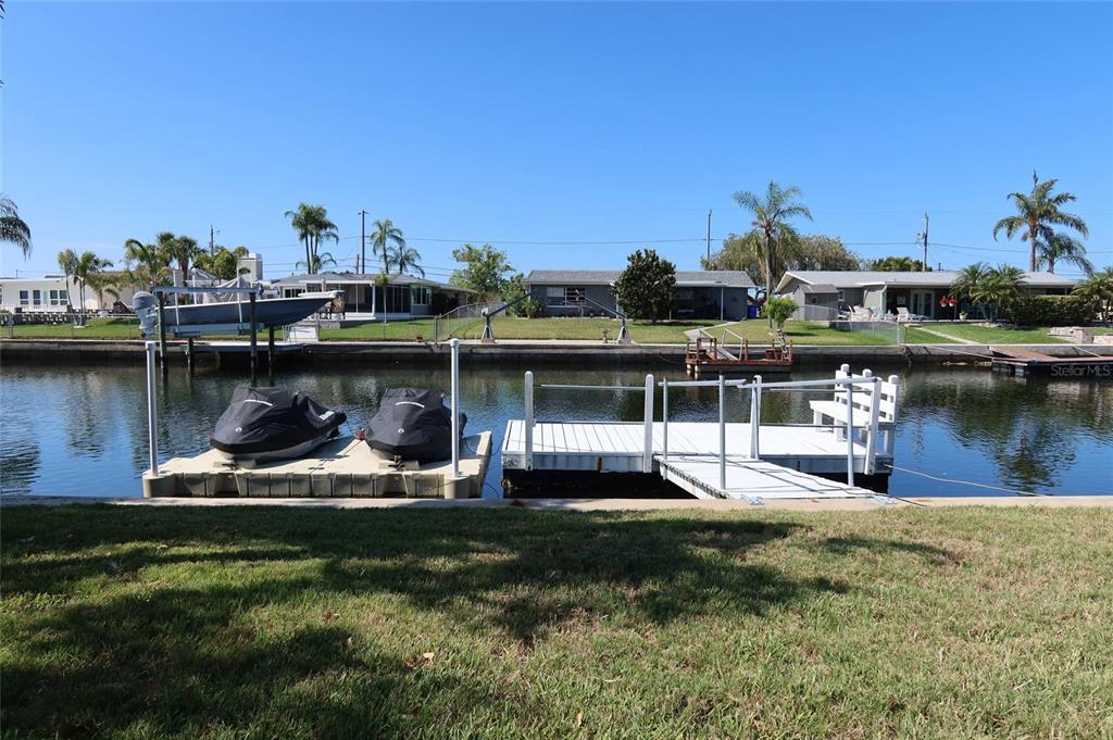 4240 Floramar Terrace New Port Richey, FL 34652 - Photo 34 of 51 a view of a lake
