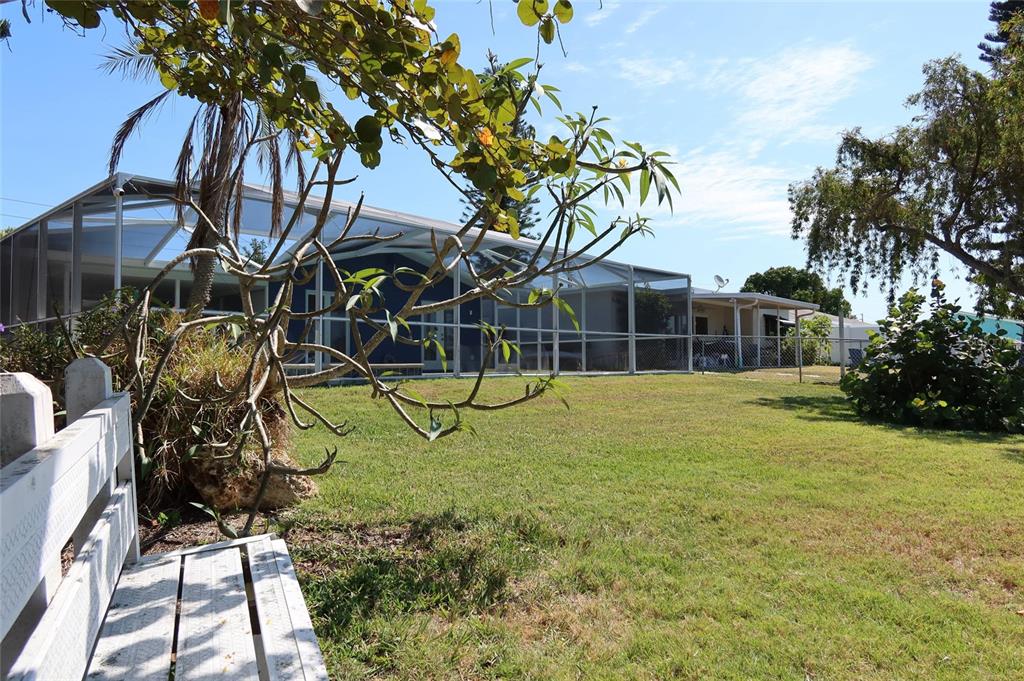 4240 Floramar Terrace New Port Richey, FL 34652 - Photo 35 of 51 a view of a house with a yard