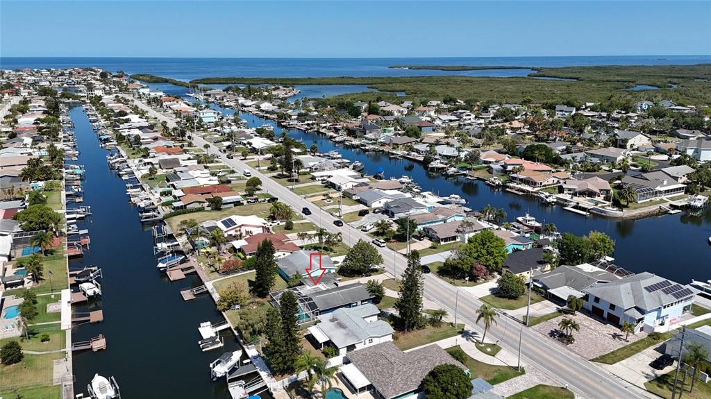 4240 Floramar Terrace New Port Richey, FL 34652 - Photo 48 of 51 an aerial view of a city with ocean view