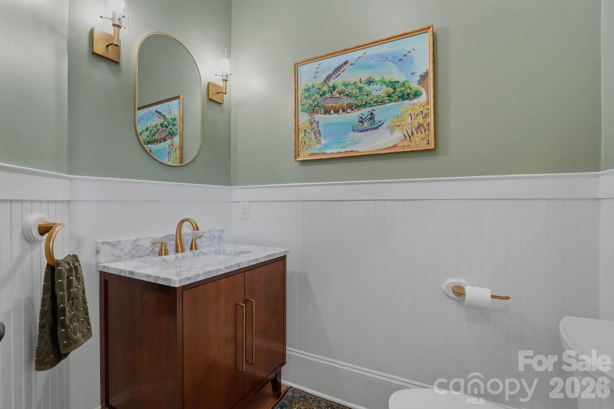 7416 Lee Rea Road Charlotte, NC 28226 - Photo 32 of 48 a bathroom with a sink and a mirror