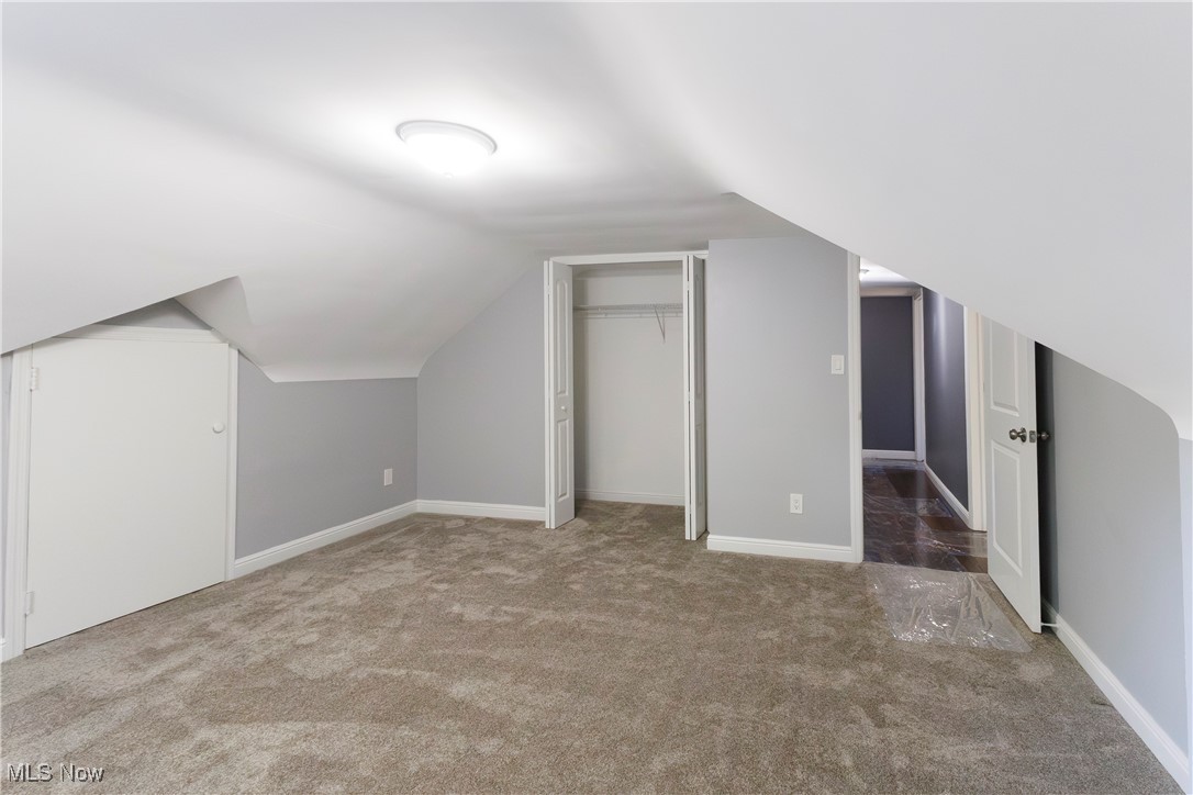 36625 Jackson Road Chagrin Falls, OH 44022 - Photo 28 of 50 Additional living space featuring lofted ceiling and carpet floors