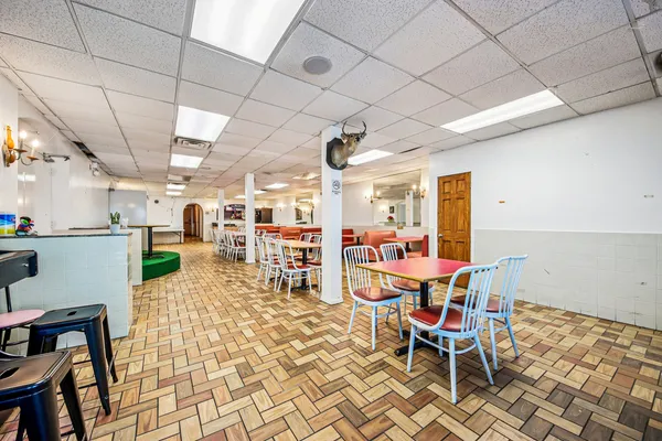 a view of a dining room with furniture