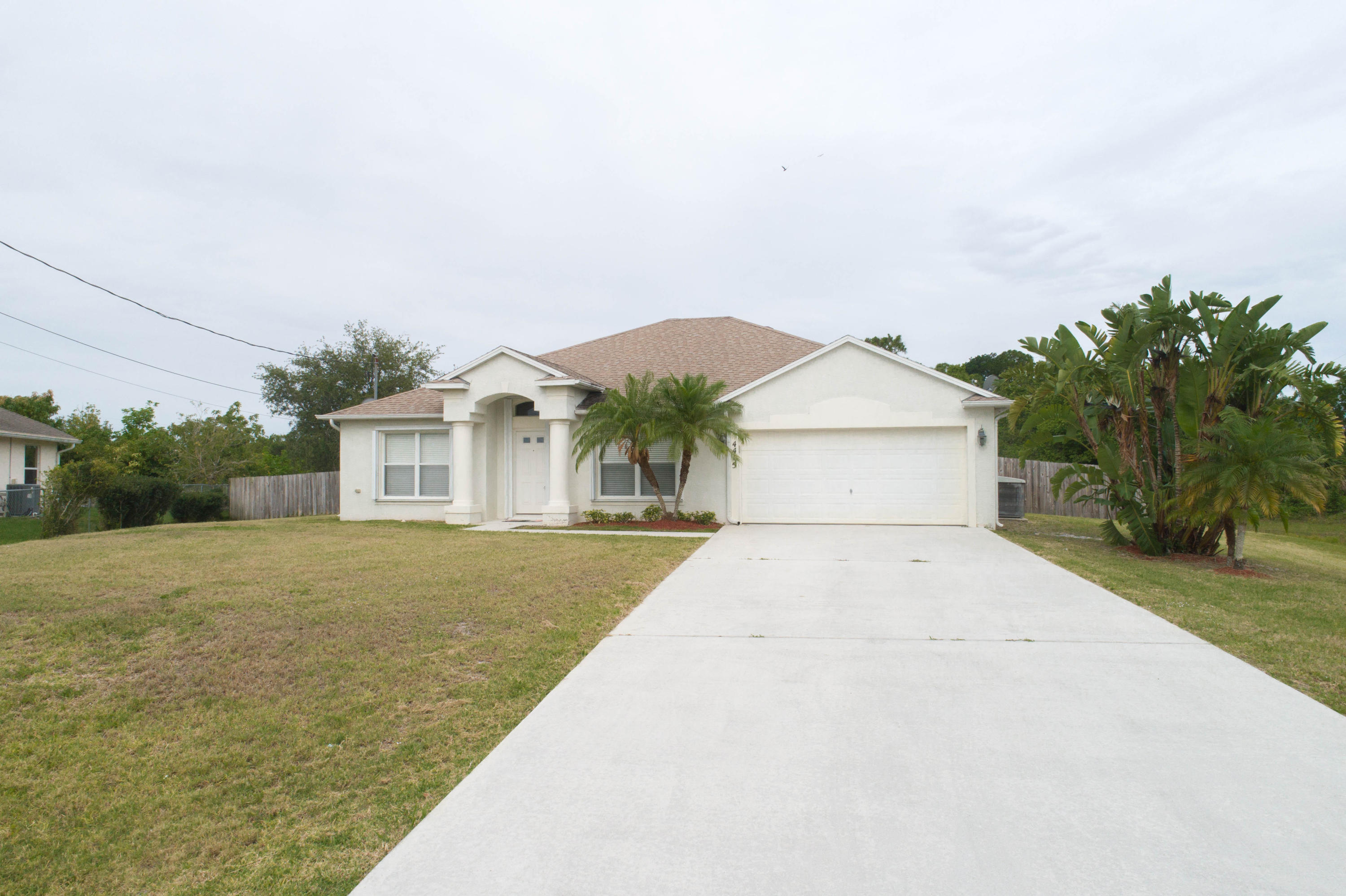 4415 Southwest Gagnon Road Port St. Lucie, FL 34953 - Photo 2 of 24 2-Front