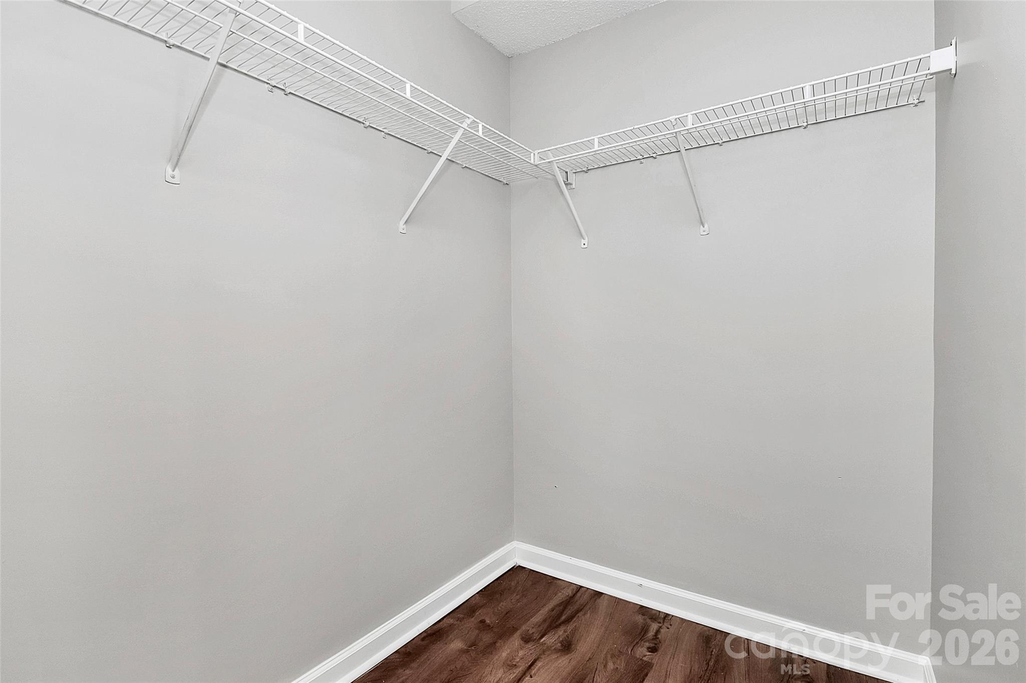1044 Sandy Point Drive Southwest Concord, NC 28025 - Photo 20 of 32 a view of a room with racks on the wall