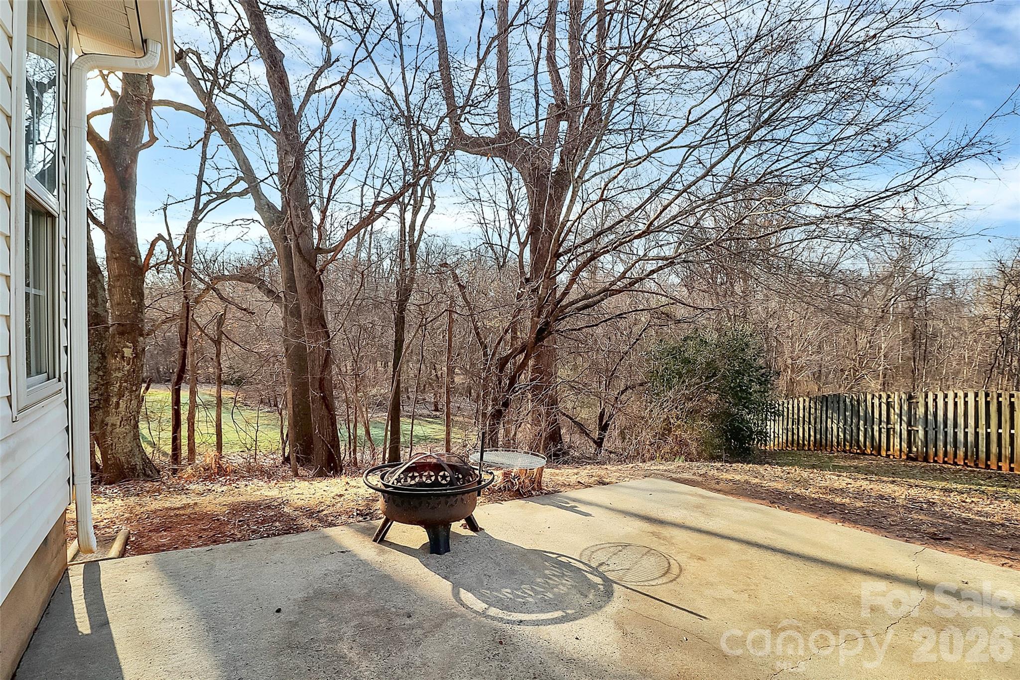 1044 Sandy Point Drive Southwest Concord, NC 28025 - Photo 30 of 32 a view of a park with bench and trees