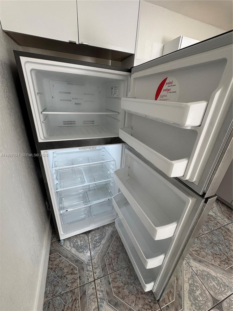 169 Northeast 50th Street, Unit 2 Miami, FL 33137 - Photo 4 of 16 a view of rack