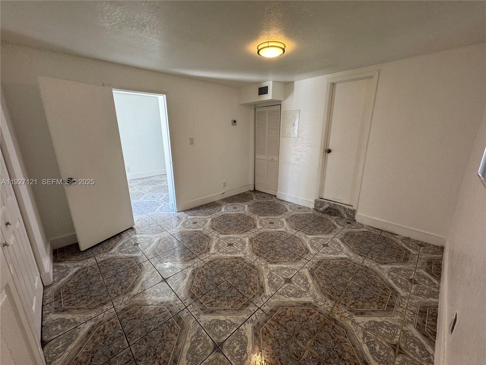 169 Northeast 50th Street, Unit 2 Miami, FL 33137 - Photo 10 of 16 a view of an empty room