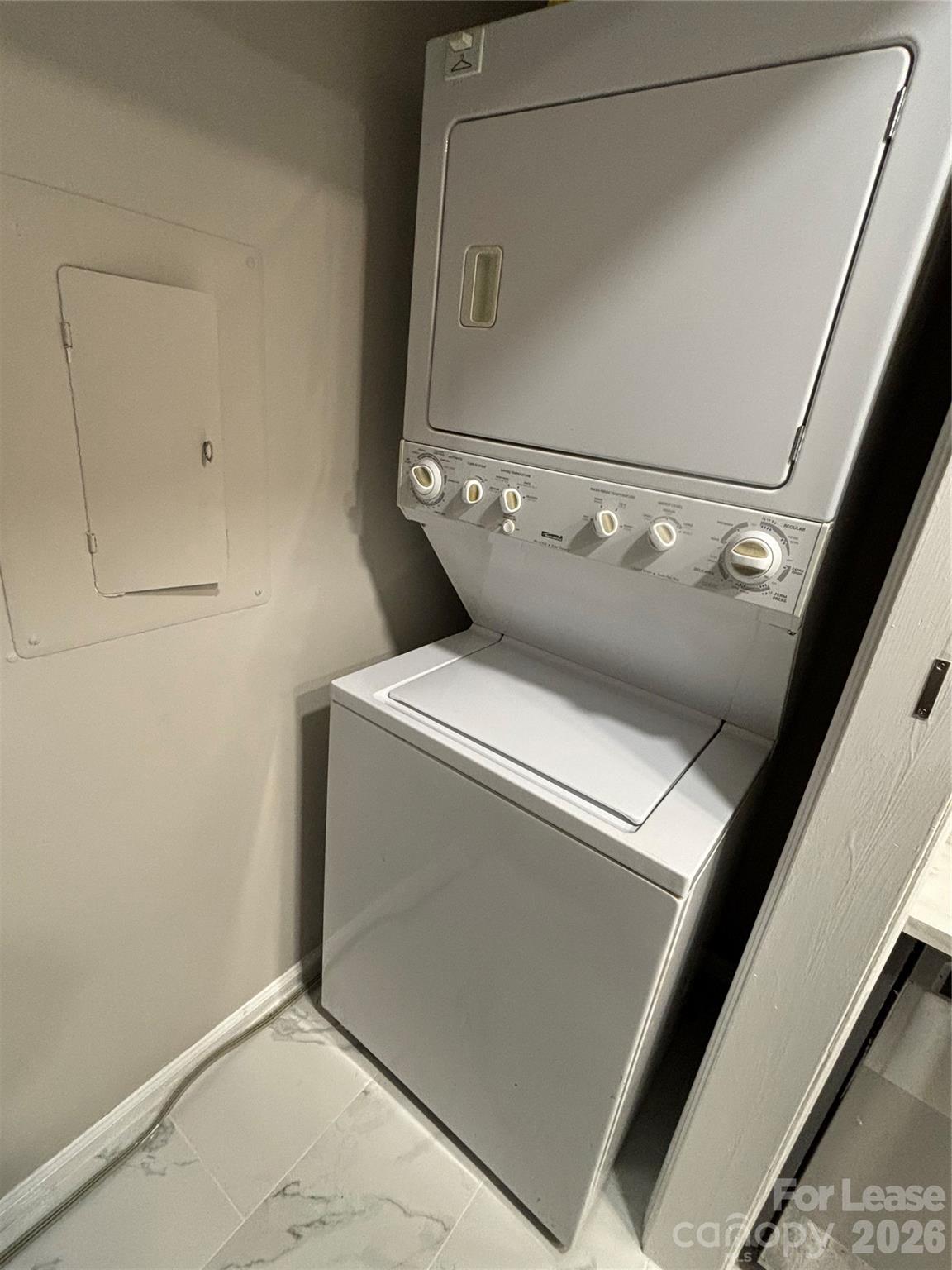 11040 Harrowfield Road Charlotte, NC 28226 - Photo 5 of 14 a utility room with dryer and washer