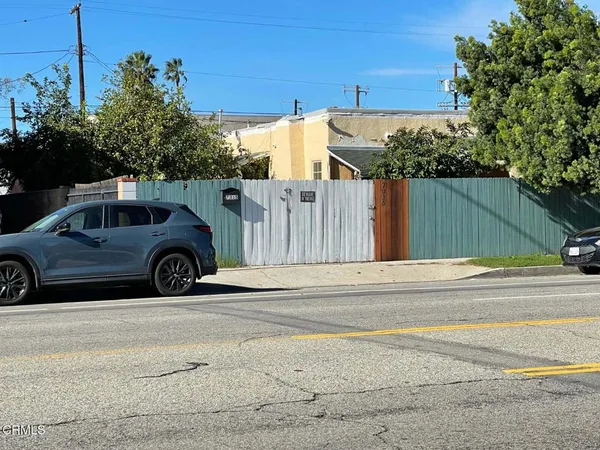 a view of a car parked on the side of the road