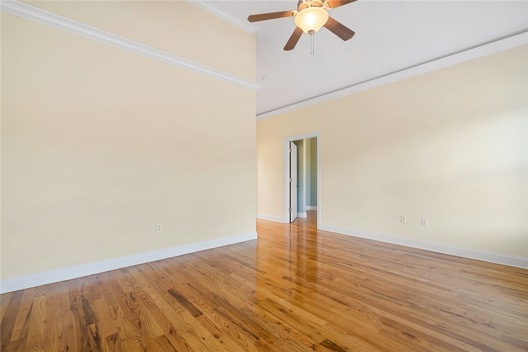16 Oleander Drive Anderson, SC 29621 - Photo 23 of 37 Refined wood floors and soaring ceilings define this inviting bedroom space.
