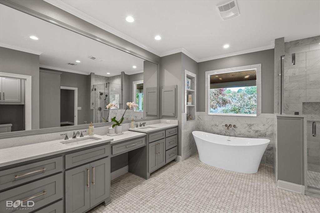 6012 East Ridge Drive Shreveport, LA 71106 - Photo 16 of 40 Primary Bathroom with marble floors and marble tile surround