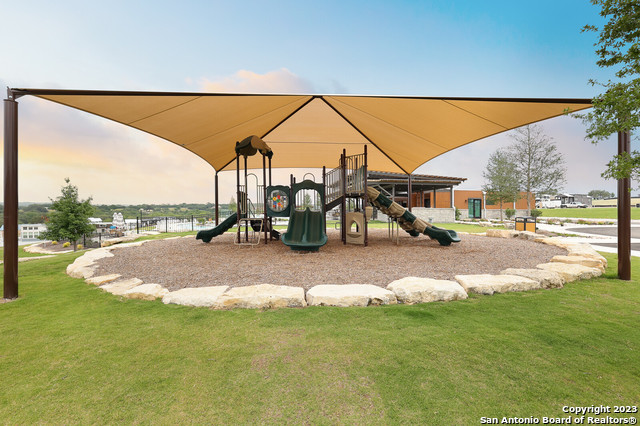 5386 Ranch Road 1376, Unit 191 Fredericksburg, TX 78624 - Photo 21 of 23 a view of swimming pool with outdoor seating and city view