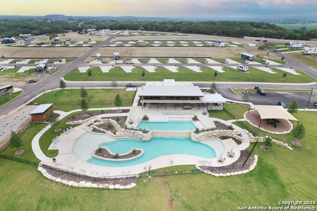 5386 Ranch Road 1376, Unit 191 Fredericksburg, TX 78624 - Photo 4 of 23 an aerial view of a house with outdoor space