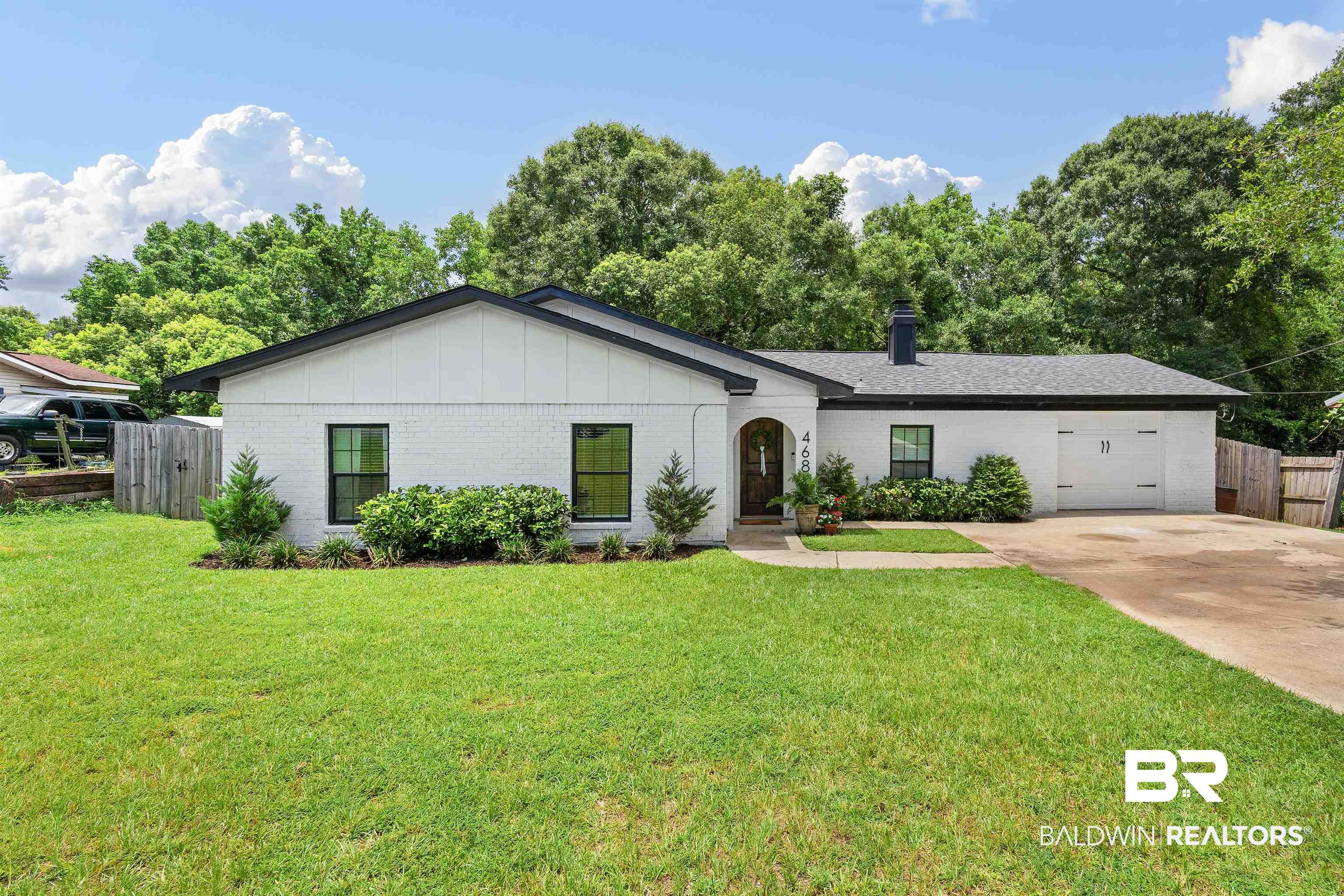 4682 Opal Drive Mobile, AL 36619 - Photo 1 of 27 Ranch-style house featuring a front lawn