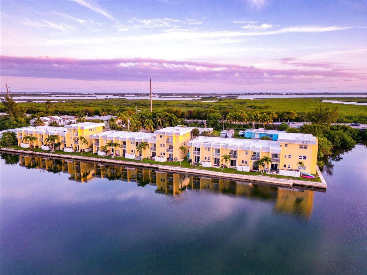 a view of a city with a lake