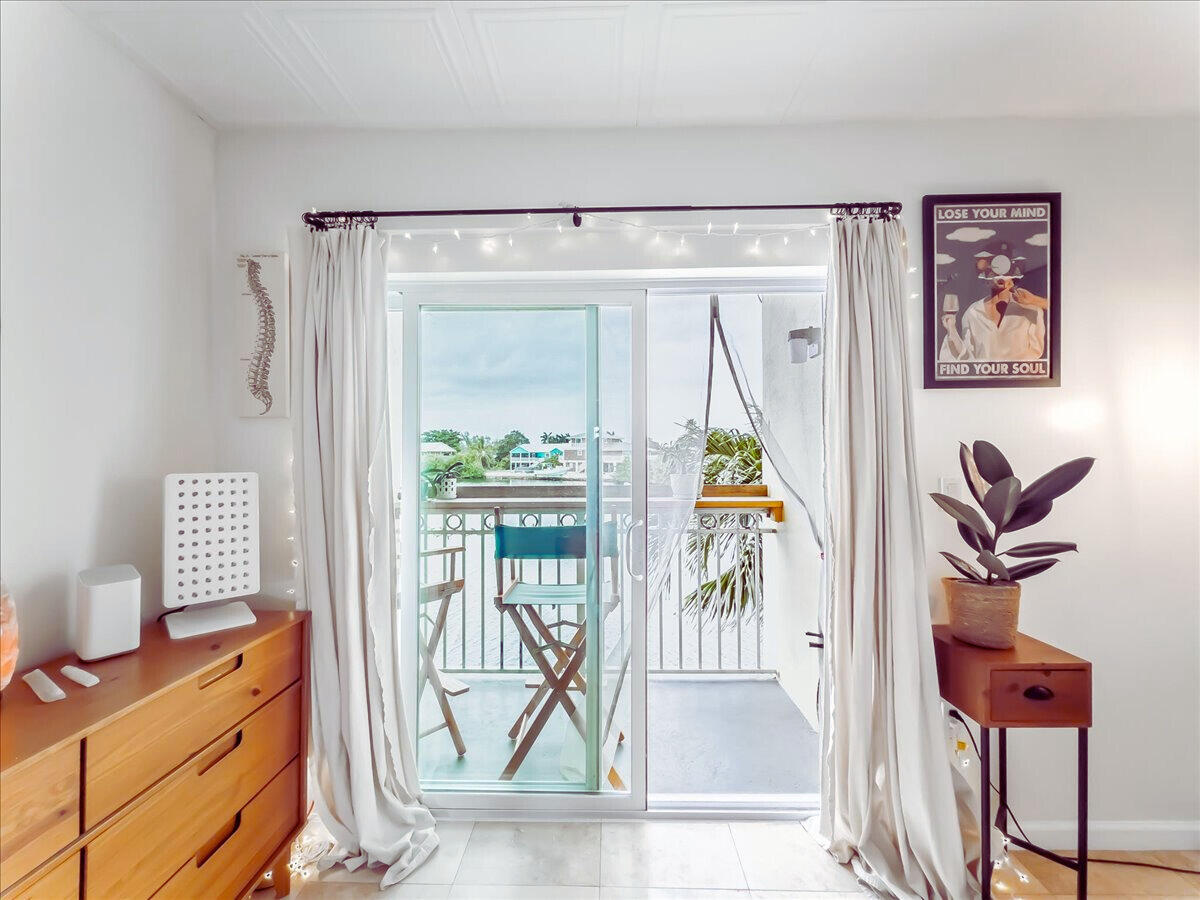 201 Coppitt Road, Unit 202A Key West, FL 33040 - Photo 11 of 21 a view of an entryway with wooden floor
