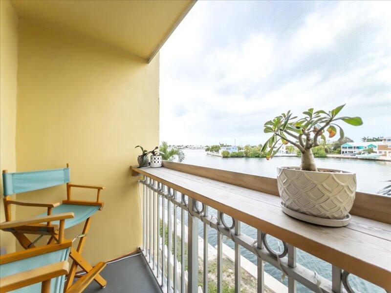 201 Coppitt Road, Unit 202A Key West, FL 33040 - Photo 13 of 21 a view of balcony with furniture
