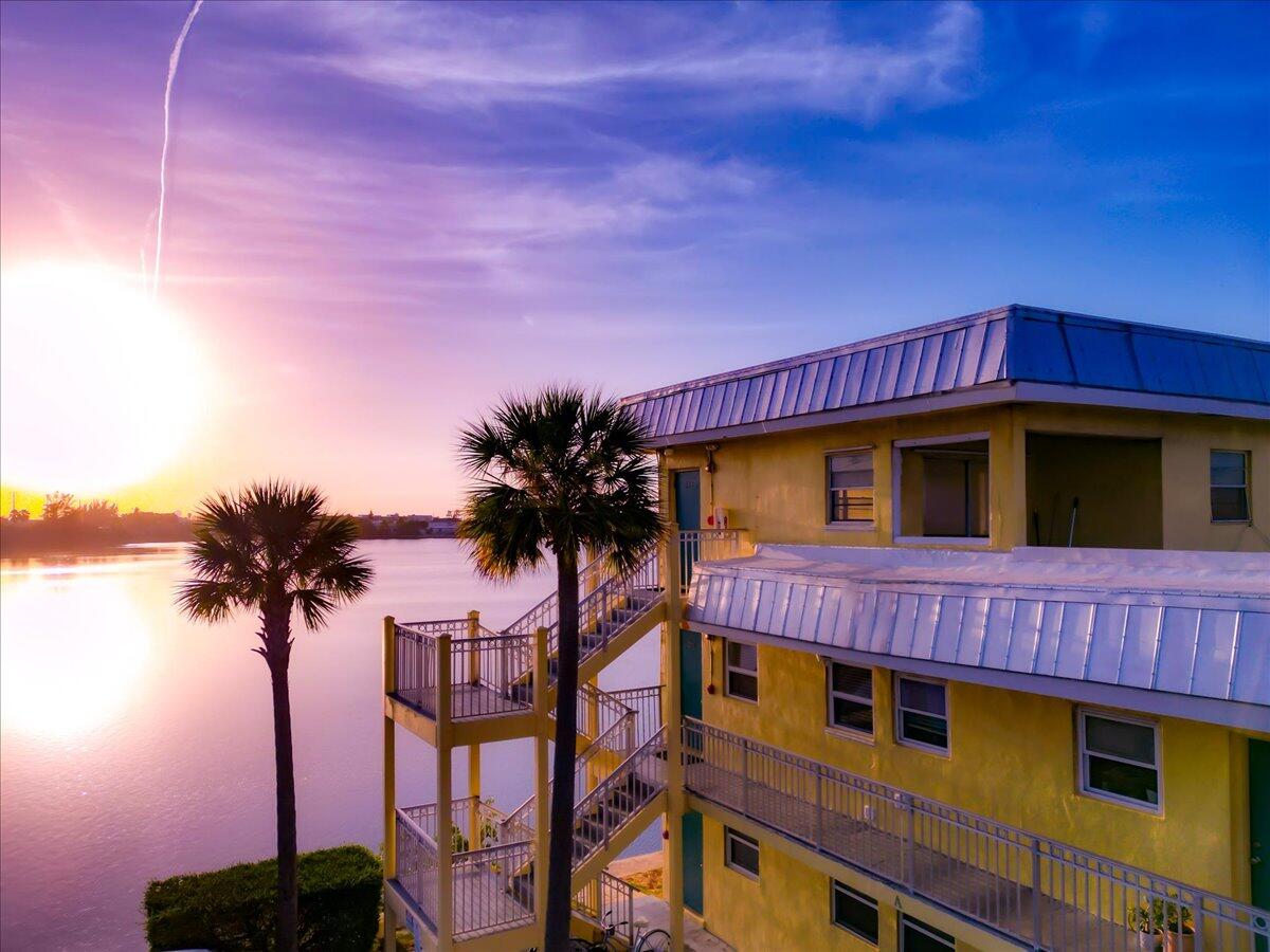 201 Coppitt Road, Unit 202A Key West, FL 33040 - Photo 20 of 21 a front view of a house with a yard