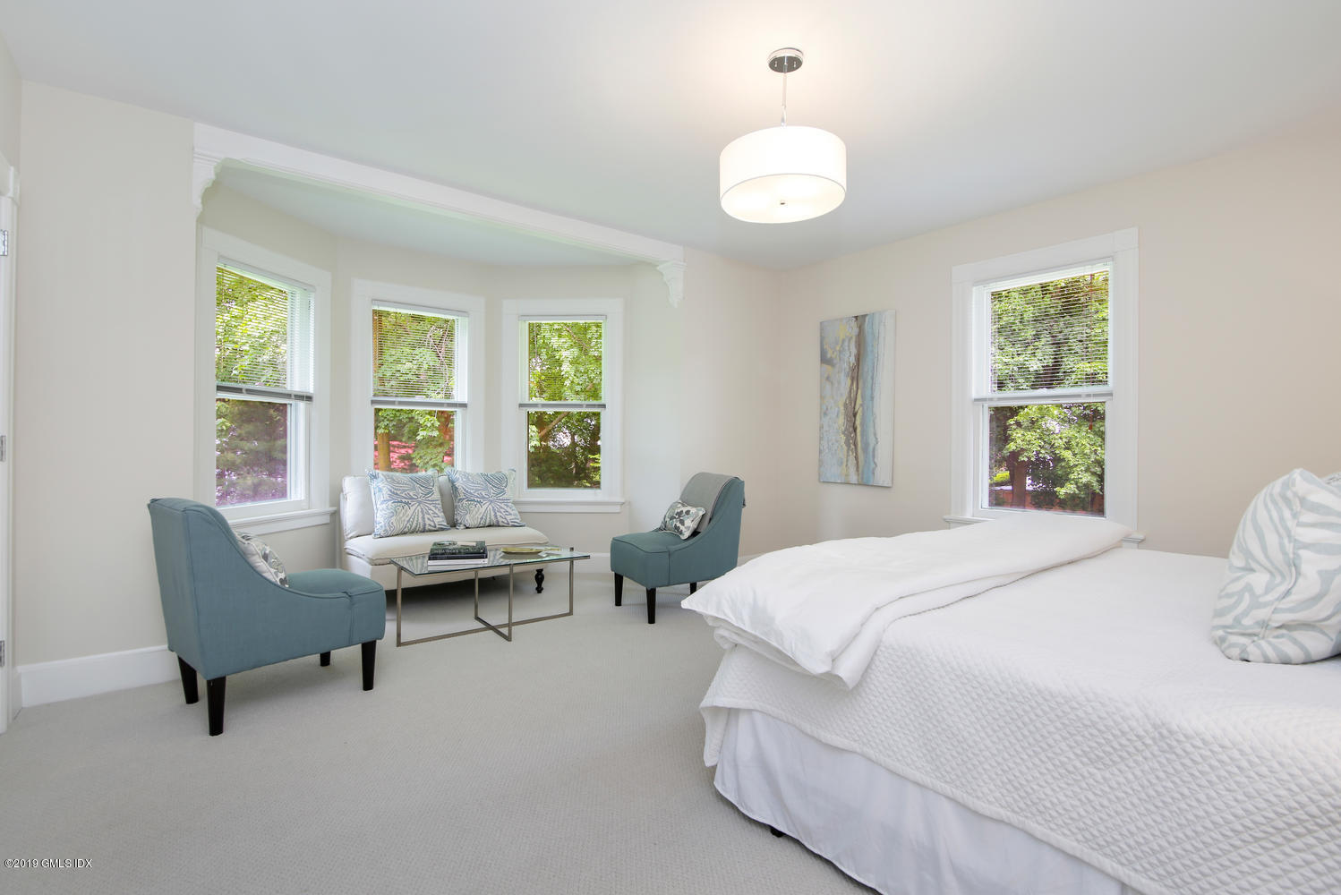 115 Riverside Avenue Riverside, CT 06878 - Photo 15 of 28 a bedroom with a bed and a couch