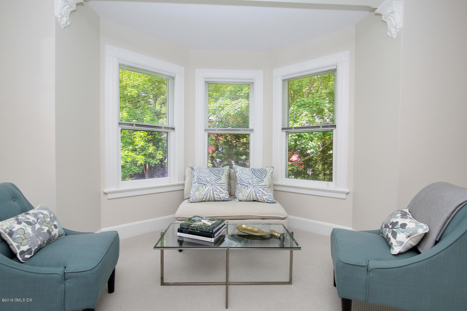 115 Riverside Avenue Riverside, CT 06878 - Photo 17 of 28 a living room with furniture and a window