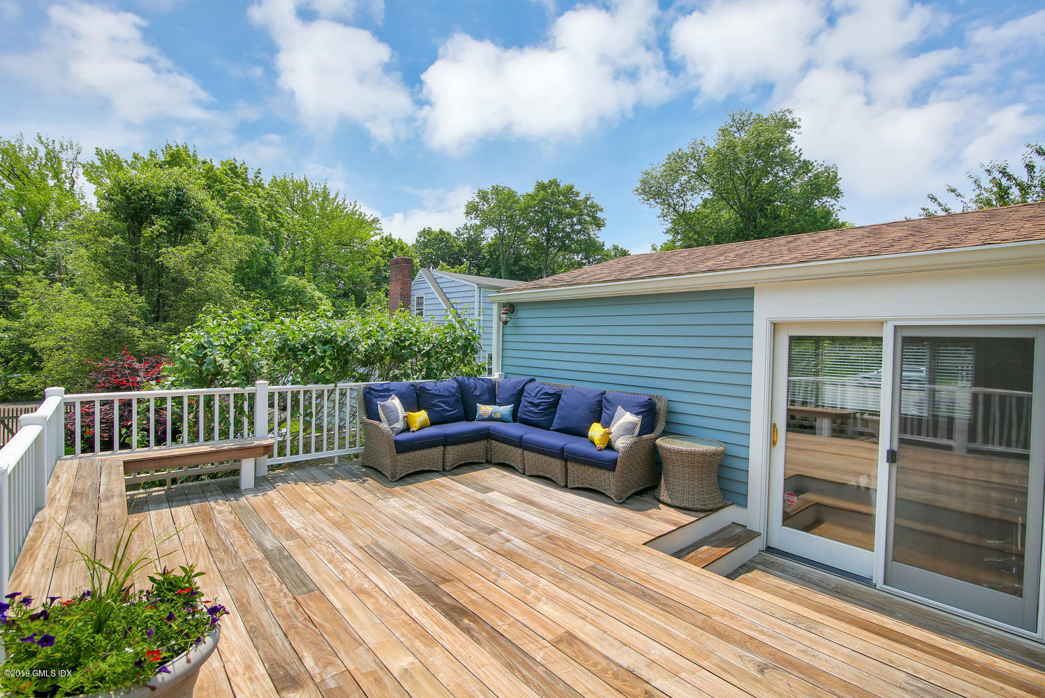 115 Riverside Avenue Riverside, CT 06878 - Photo 23 of 28 a view of a roof deck with couches