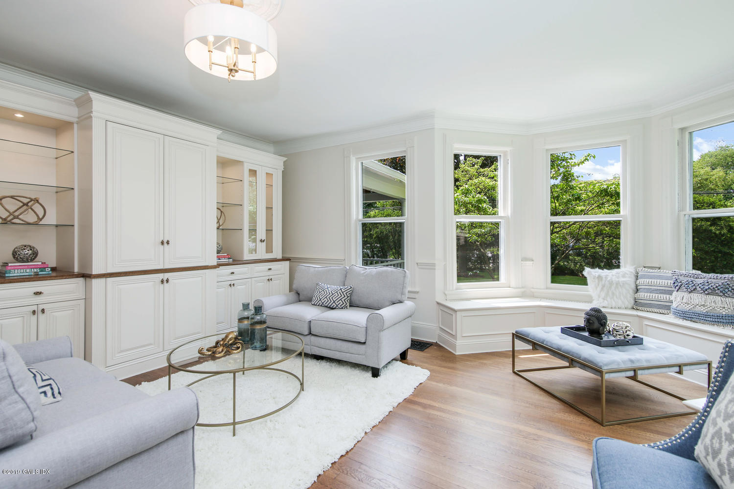 115 Riverside Avenue Riverside, CT 06878 - Photo 5 of 28 a living room with furniture and a large window