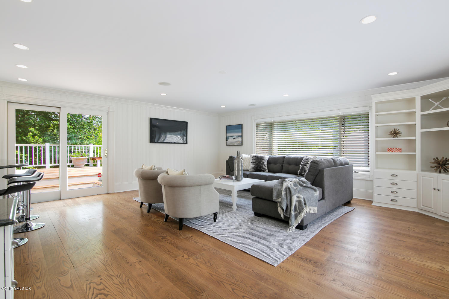 115 Riverside Avenue Riverside, CT 06878 - Photo 8 of 28 a living room with furniture and a large window
