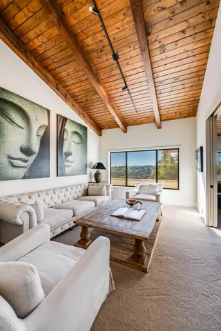 a view of a terrace with furniture