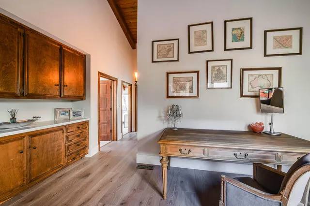 a view of a swimming pool with a yard