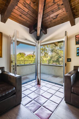 a view of a lake with houses in the back