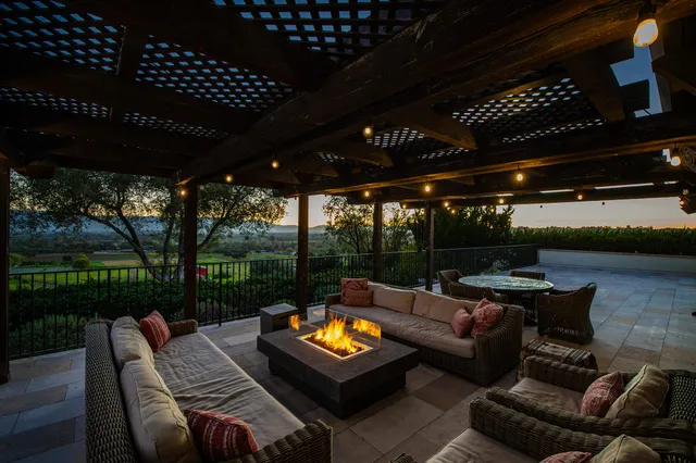 a view of swimming pool with seating area and furniture