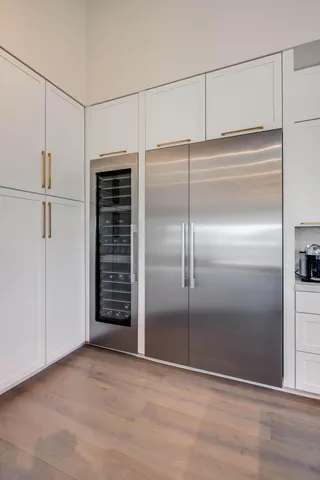 a bedroom with a bed and a walk in closet