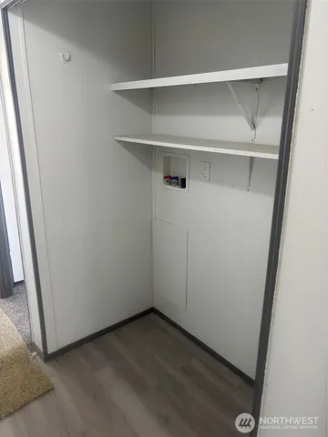 a view of an empty walk in closet