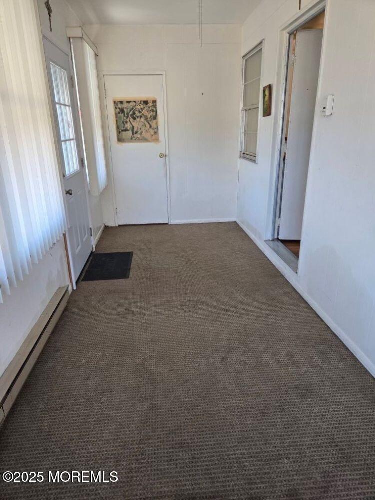 106 Hope Road, Unit C Whiting, NJ 08759 - Photo 7 of 11 an empty room with windows