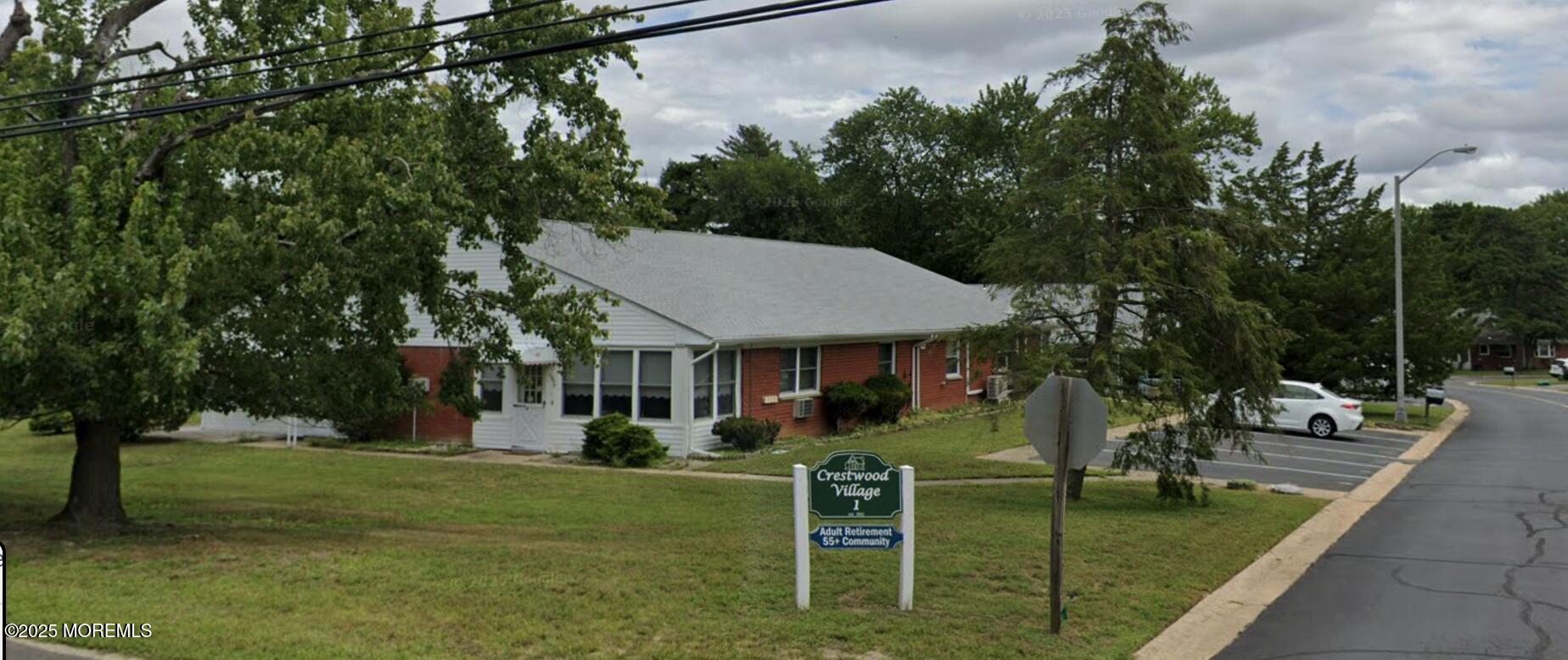 106 Hope Road, Unit C Whiting, NJ 08759 - Photo 10 of 11 a view of a house with a backyard porch and sitting area