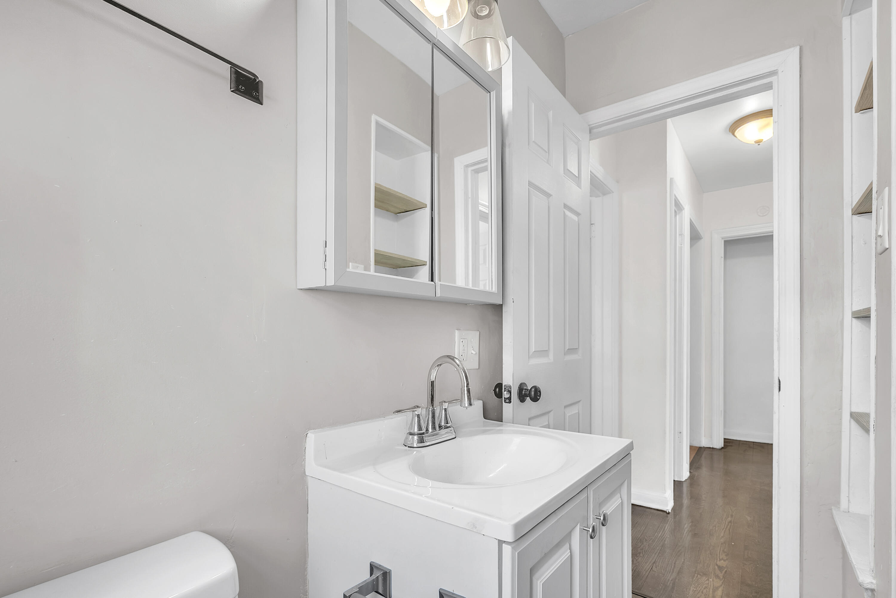 263 Rutledge Street Gary, IN 46404 - Photo 16 of 21 a bathroom with a sink a toilet and shower