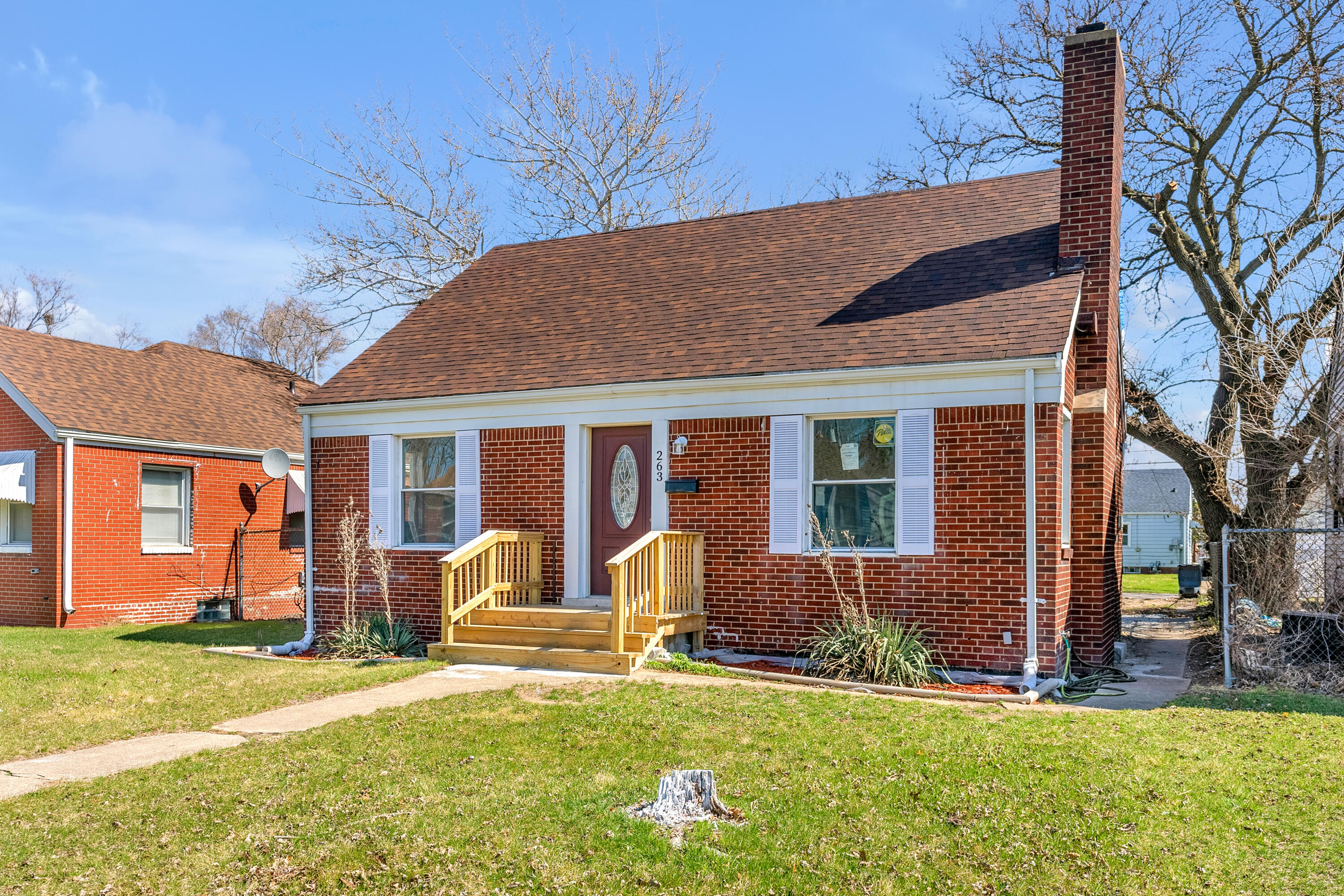 263 Rutledge Street Gary, IN 46404 - Photo 2 of 21 front view of a house with a yard