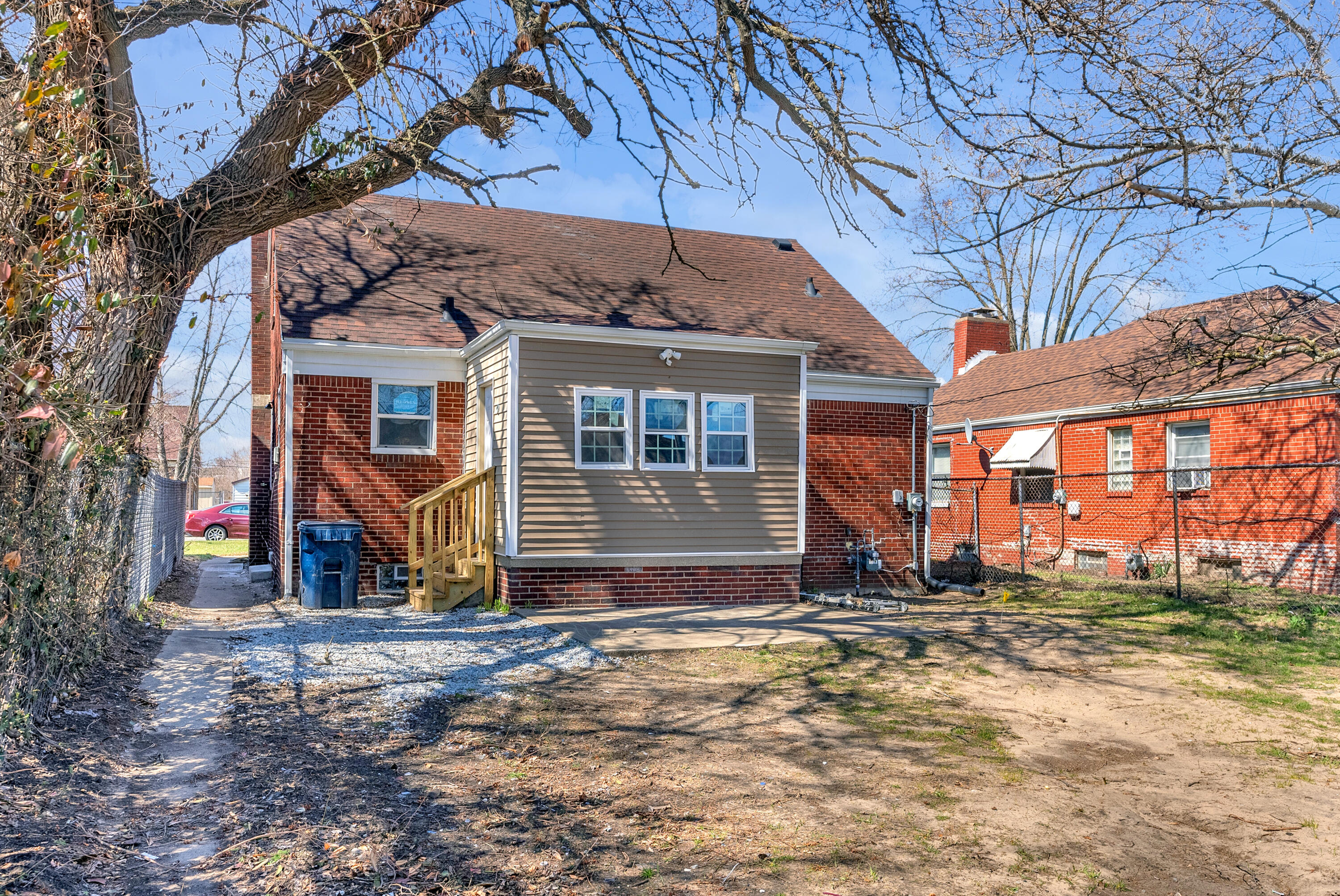 263 Rutledge Street Gary, IN 46404 - Photo 3 of 21 a view of a house with a yard