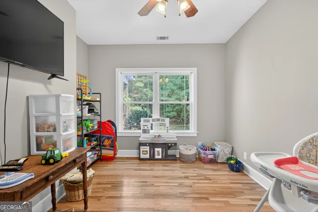 a view of a forest that has large trees