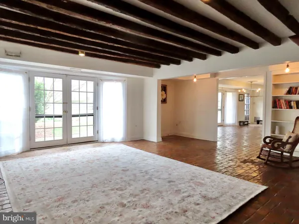 a view of a livingroom with wooden floor