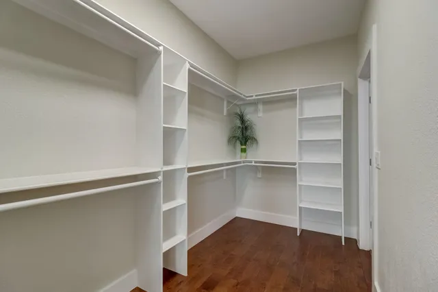 a view of an empty walk in closet