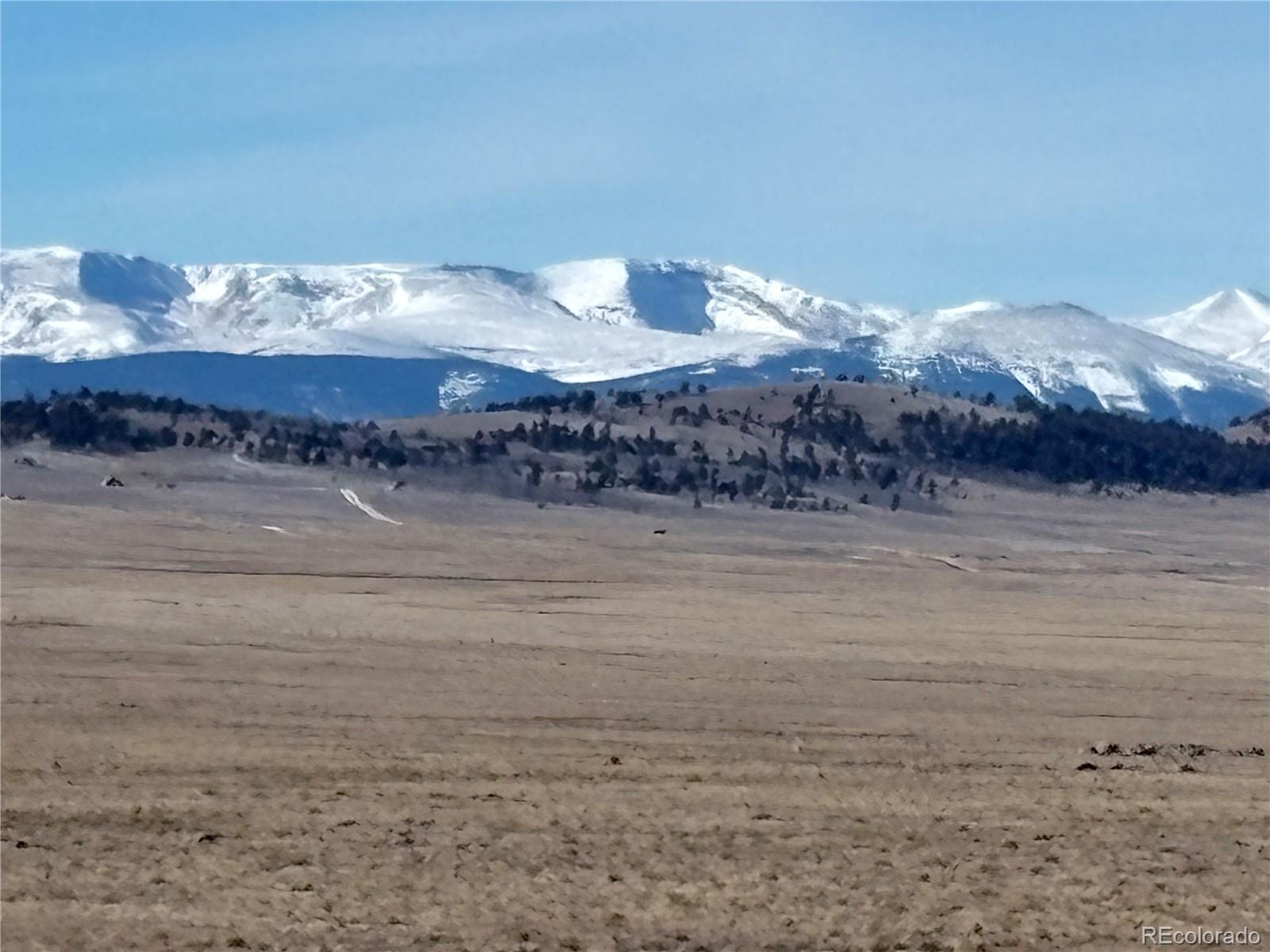 809 Rocky Mountain Road Hartsel, CO 80449 - Photo 3 of 26 a view of a lake